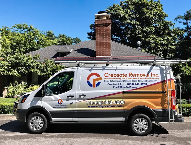 Canton Chimney Sweep technician removing creosote safely in Canton, CT